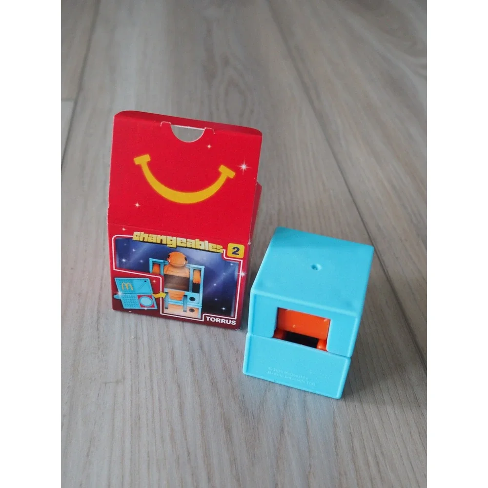 New McDonalds Changeables 2 Torrus Orange Blue Happy Meal Toy Robot Dinosaur